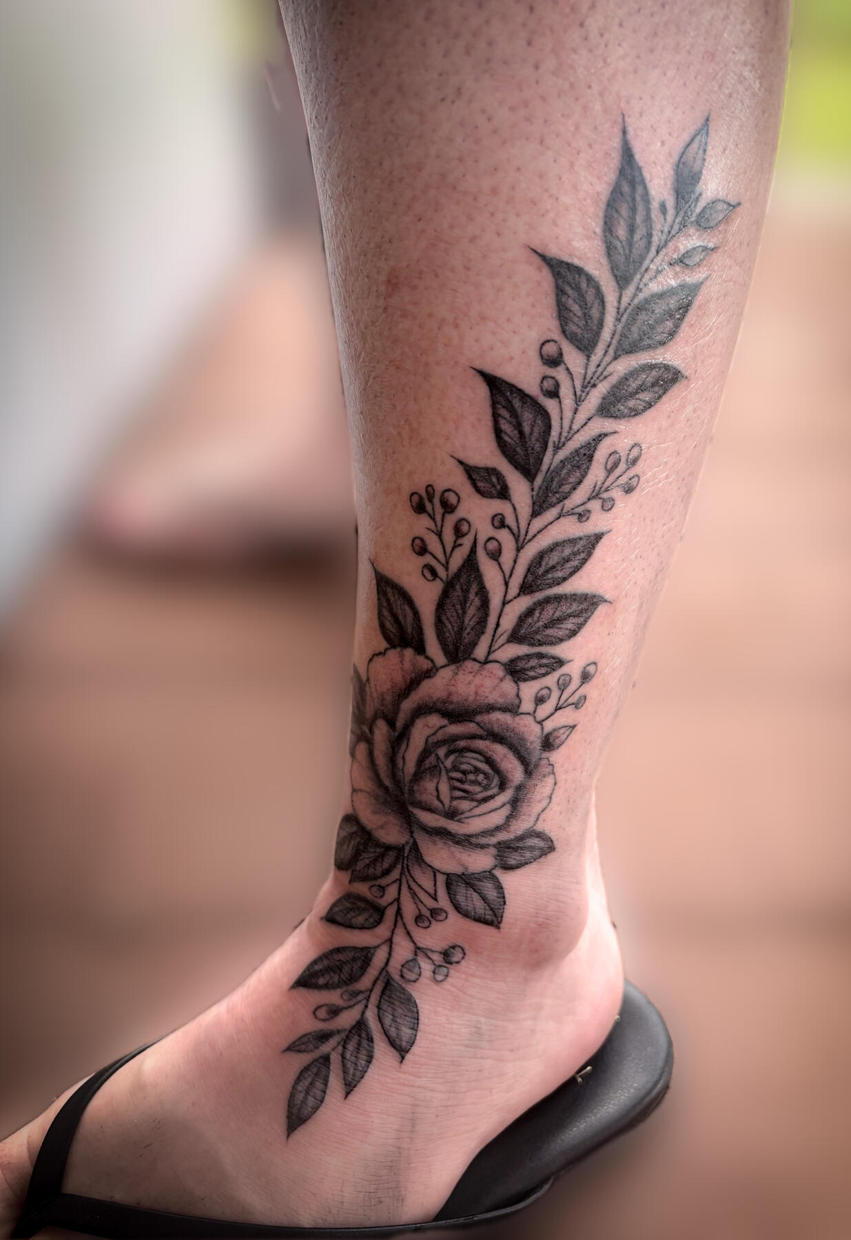 Floral foot/leg tattoo